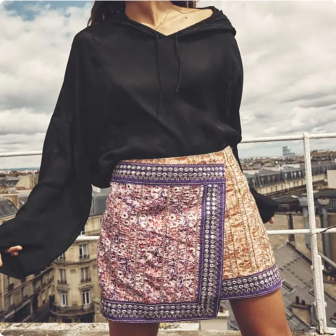 Falda morada y beige