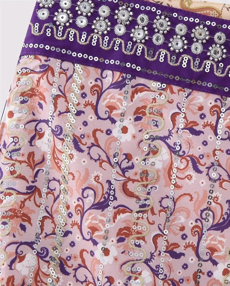 Falda morada y beige